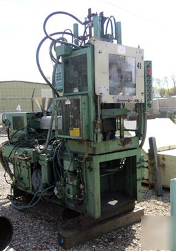 New used: bury 75 ton vertical injection molder. has 9 o