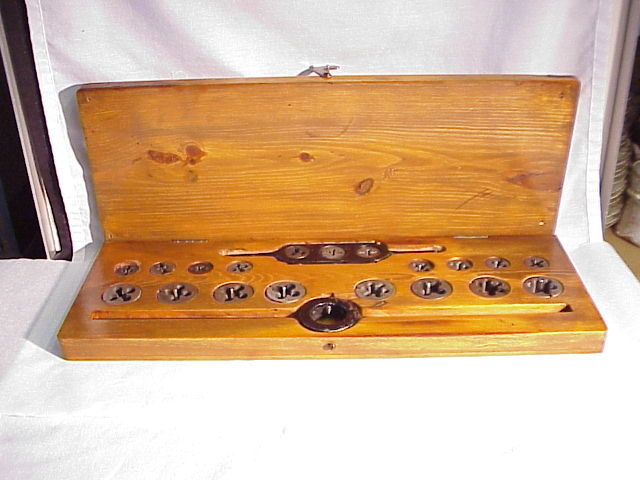 Vintage assorted size threading die set in wood case