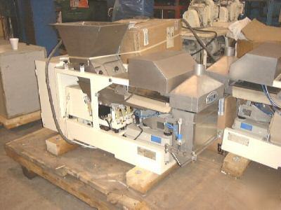 Net weighing, vibrating pan feeders 2074