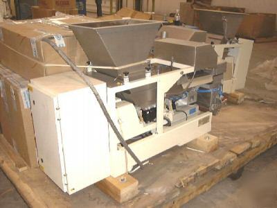 Net weighing, vibrating pan feeders 2074