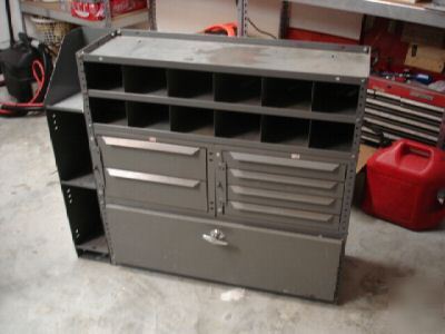 Metal storage cabinets for cargo vans