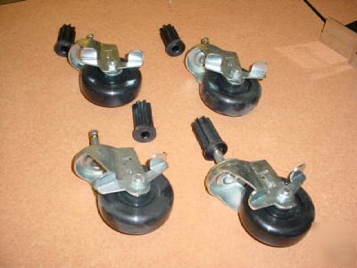 4 locking casters w/ hard rubber wheels and inserts 