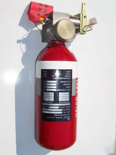 Halon 1301 lanyard type aircraft fire extinguisher . 