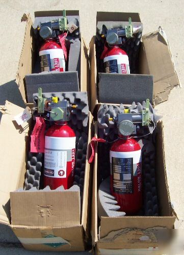 Halon 1301 lanyard type aircraft fire extinguisher . 