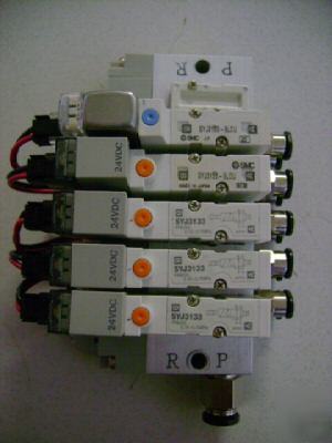 Lot of 5 smc solenoid valves on pneumatic block